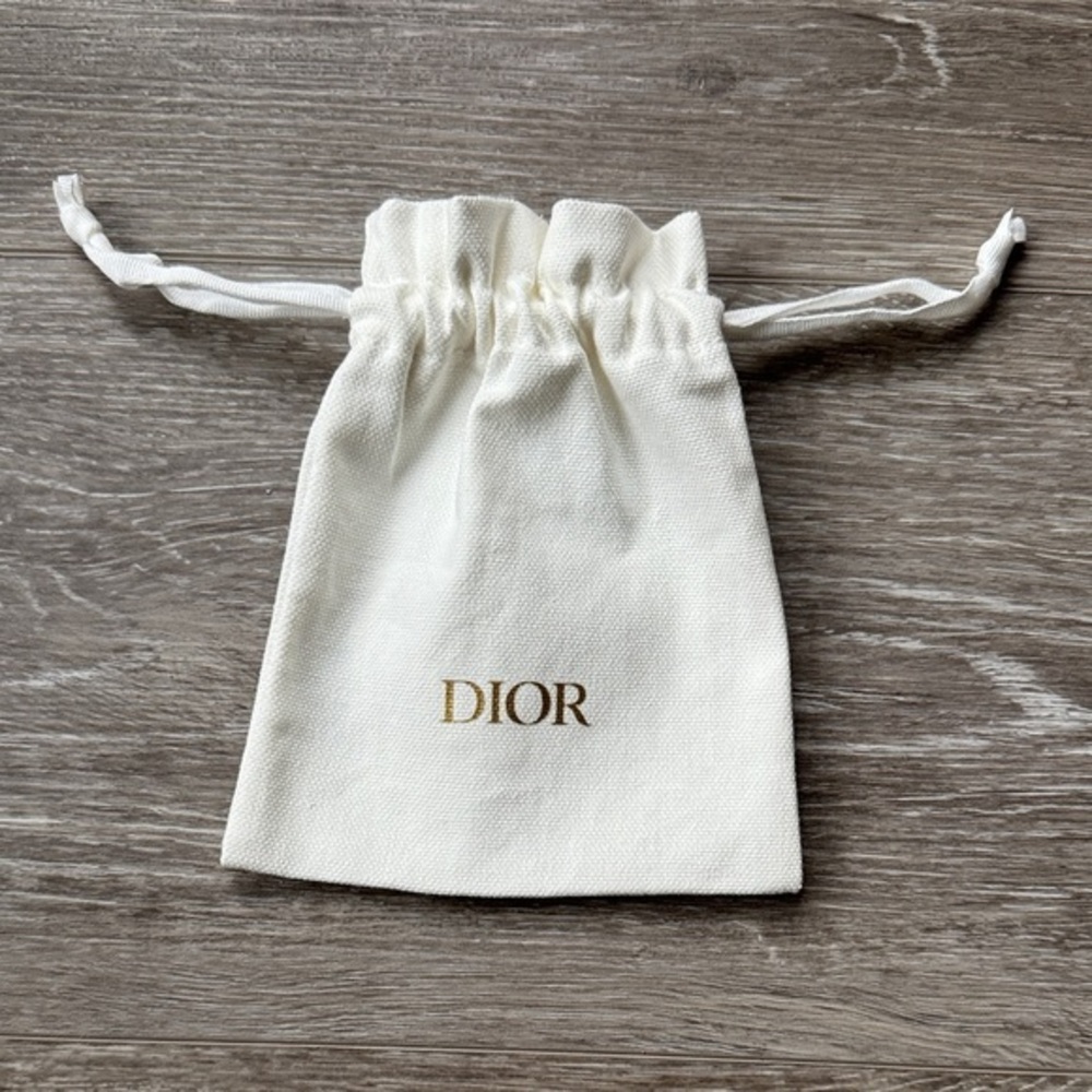 DIOR Cream Drawstring Bag with Gold Logo